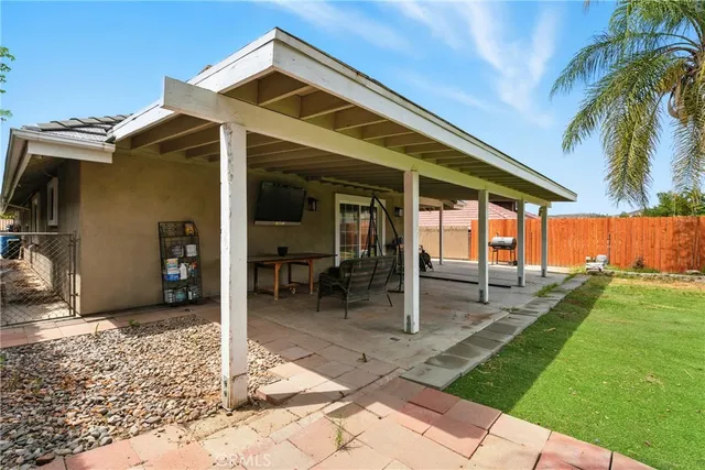 a view of a house with a patio
