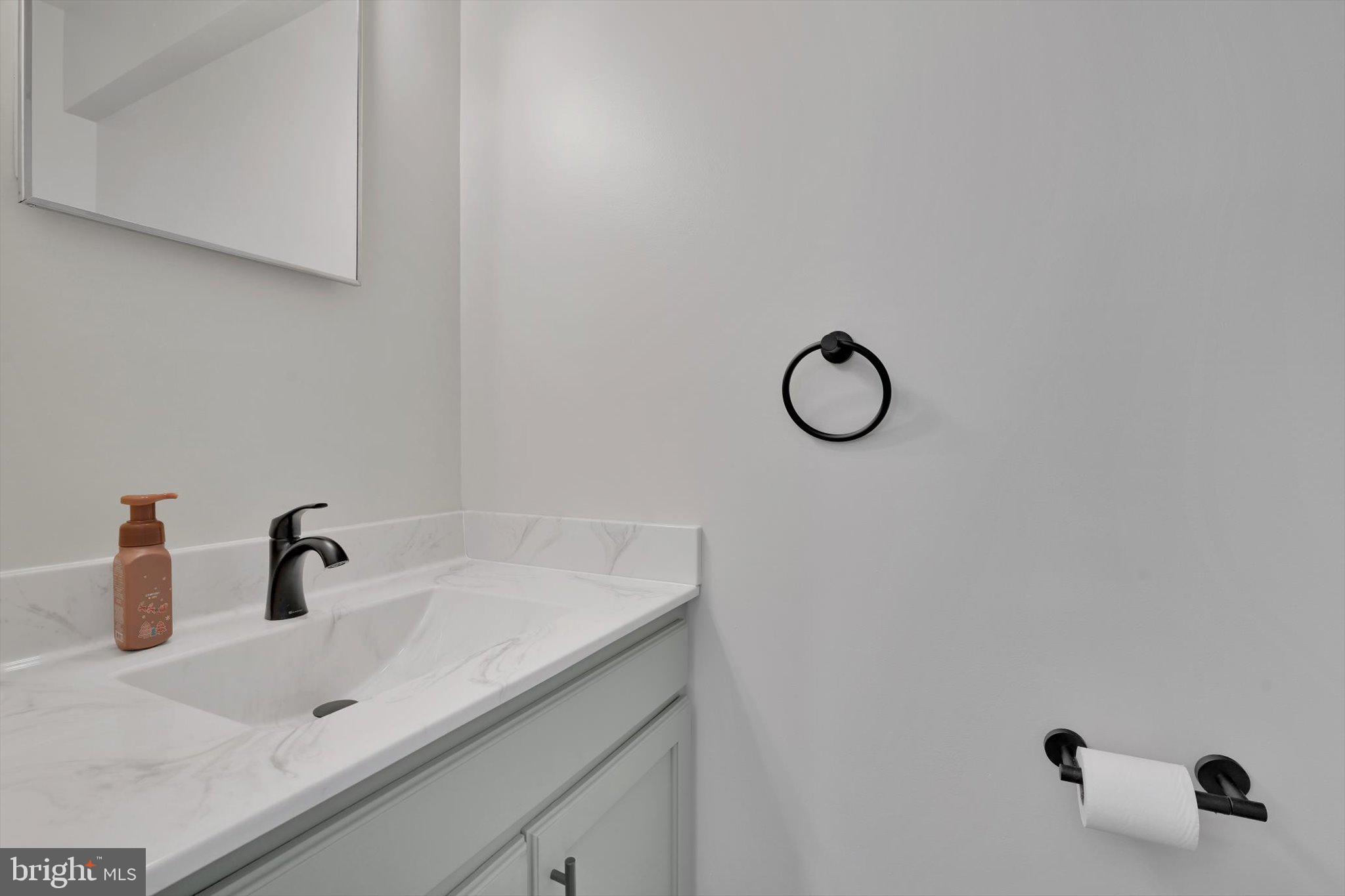 2604 Village Road Orwigsburg, PA 17961 - Photo 18 of 24 a bathroom with a sink and mirror