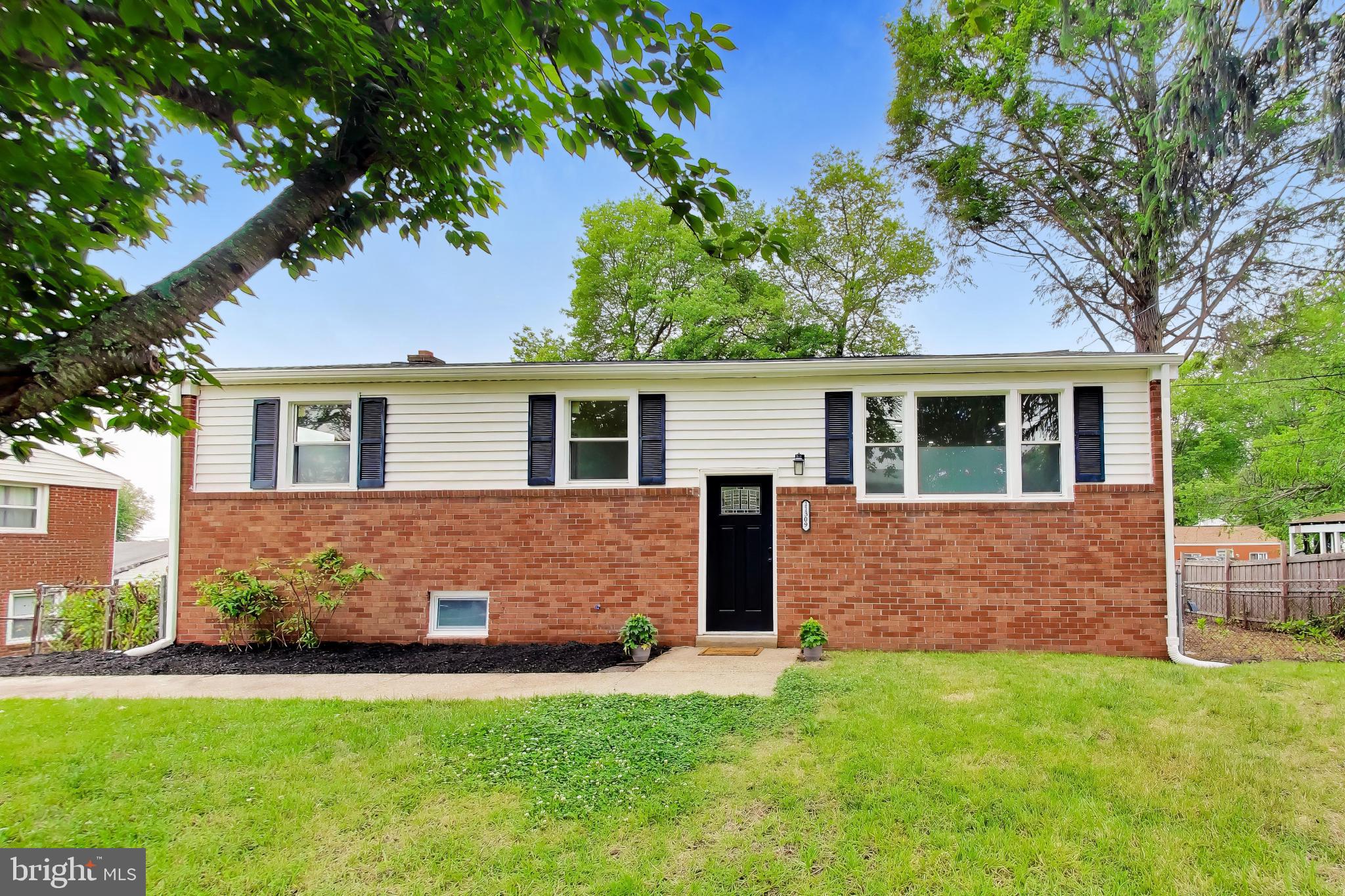 11309 Keystone Avenue Clinton, MD 20735 - Photo 36 of 36 front view of a house with a yard