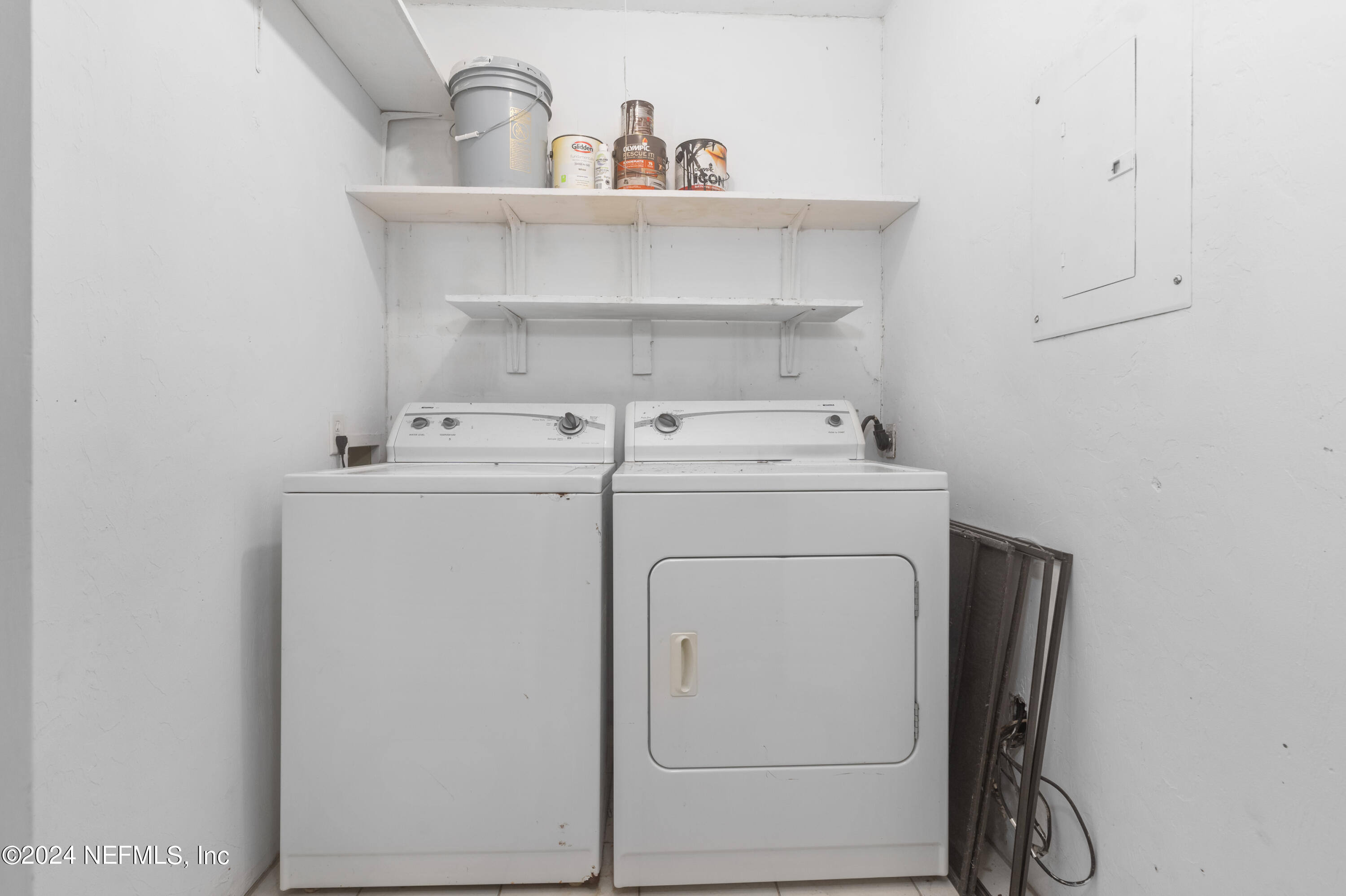 5720 Southwest 8th Place Gainesville, FL 32607 - Photo 15 of 17 a utility room with dryer and washer
