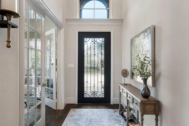 a view of an entryway with a front door