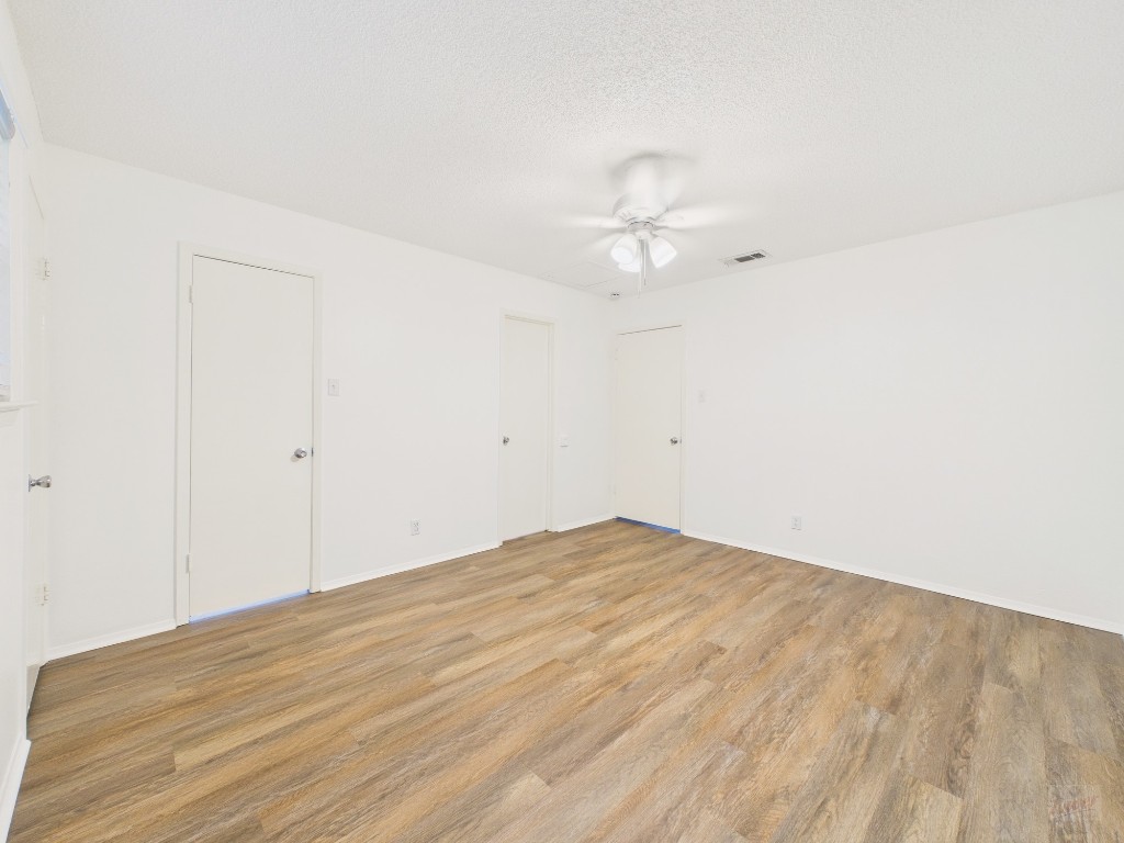 1305 Hollow Creek Drive, Unit 4 Austin, TX 78704 - Photo 10 of 21 a view of empty room with wooden floor