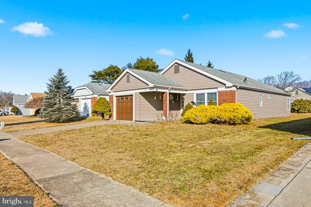 a house with trees in front of it