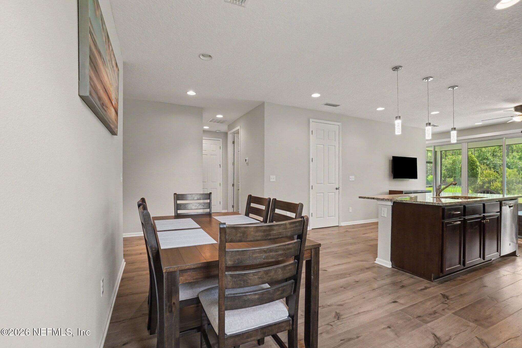 4630 Pine Ridge Parkway Middleburg, FL 32068 - Photo 9 of 35 a view of a dining room with furniture