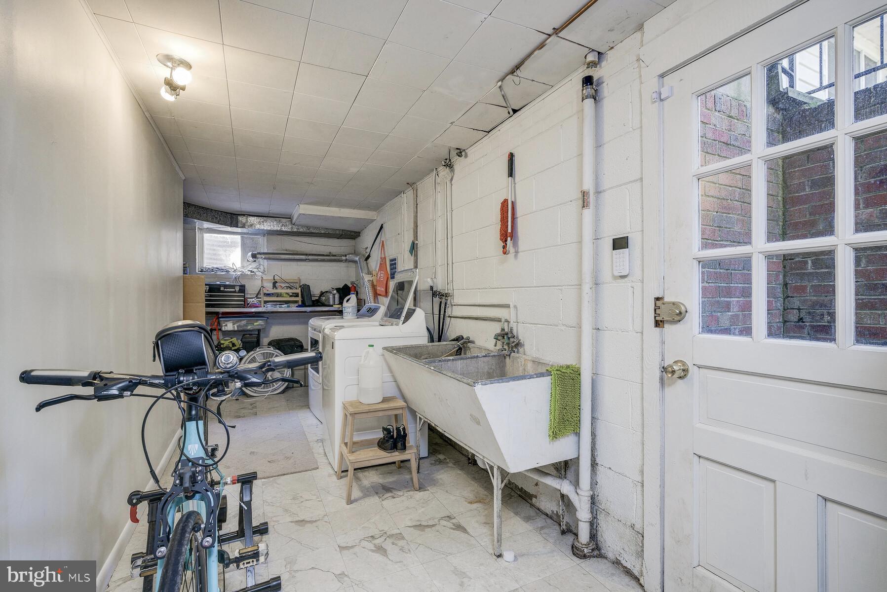5512 Christy Drive Bethesda, MD 20816 - Photo 34 of 40 Utility room w door to backyard