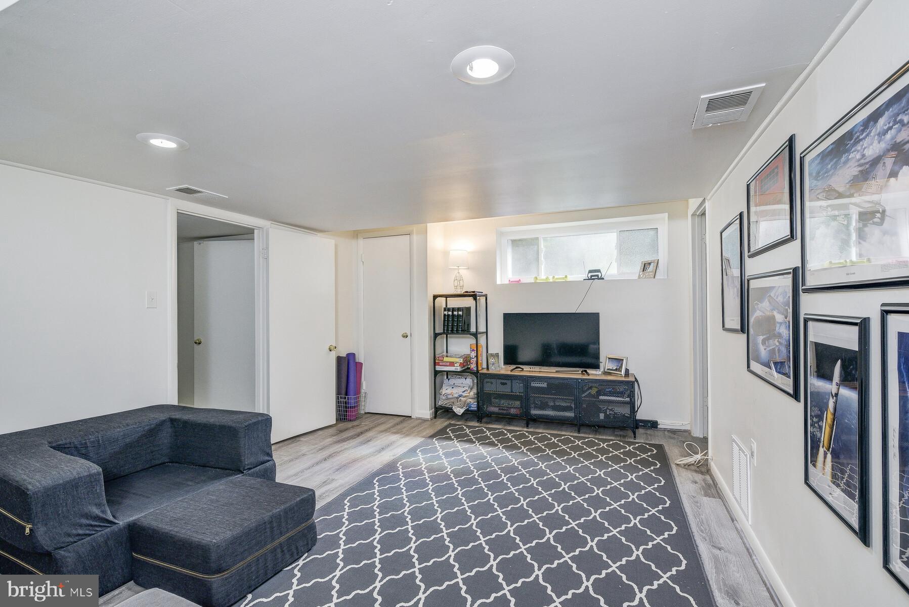 5512 Christy Drive Bethesda, MD 20816 - Photo 35 of 40 Lowest level recreation room