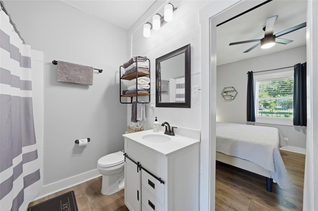 2320 Mistletoe Street Waco, TX 76706 - Photo 10 of 23 a bathroom with a sink toilet tub and shower