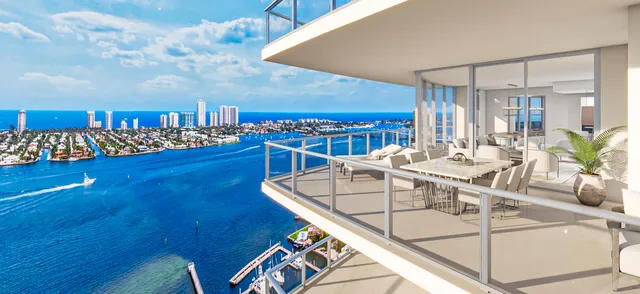 a view of a dining room with furniture and floor to ceiling window