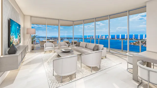 a living room with a large window and furniture