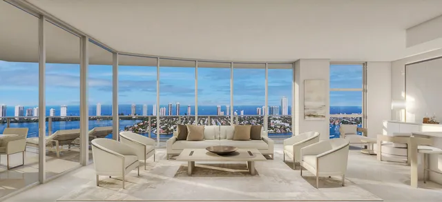 a living room with furniture kitchen view and a large window