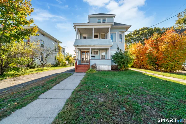 a front view of house with yard
