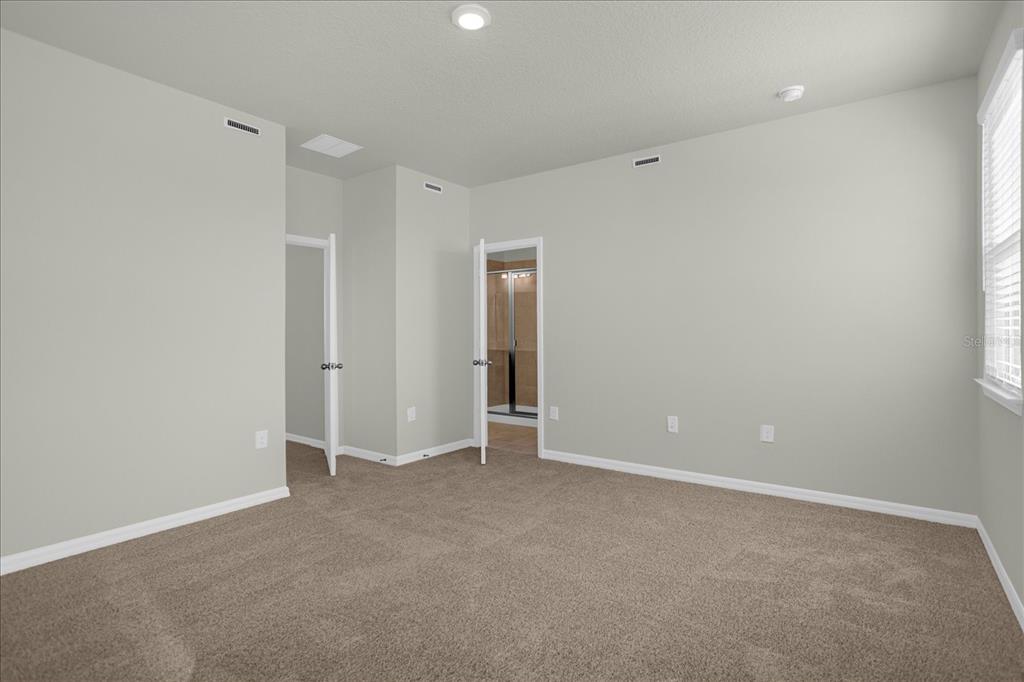 4438 Small Creek Road Kissimmee, FL 34744 - Photo 11 of 21 a view of an empty room