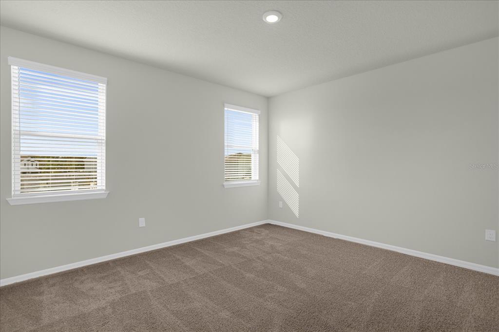 4438 Small Creek Road Kissimmee, FL 34744 - Photo 12 of 21 an empty room with a window