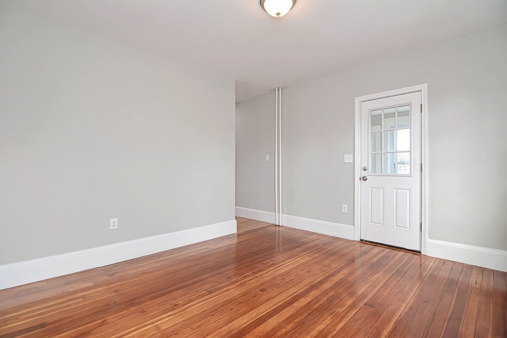 14 Allen Road Norwood, MA 02062 - Photo 21 of 36 a view of an empty room with wooden floor