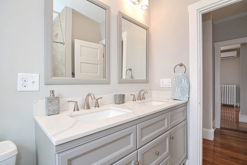14 Allen Road Norwood, MA 02062 - Photo 23 of 36 a bathroom with a sink and a mirror