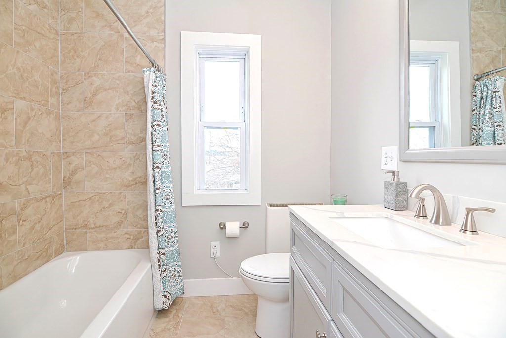 14 Allen Road Norwood, MA 02062 - Photo 24 of 36 a bathroom with a sink toilet vanity and bathtub