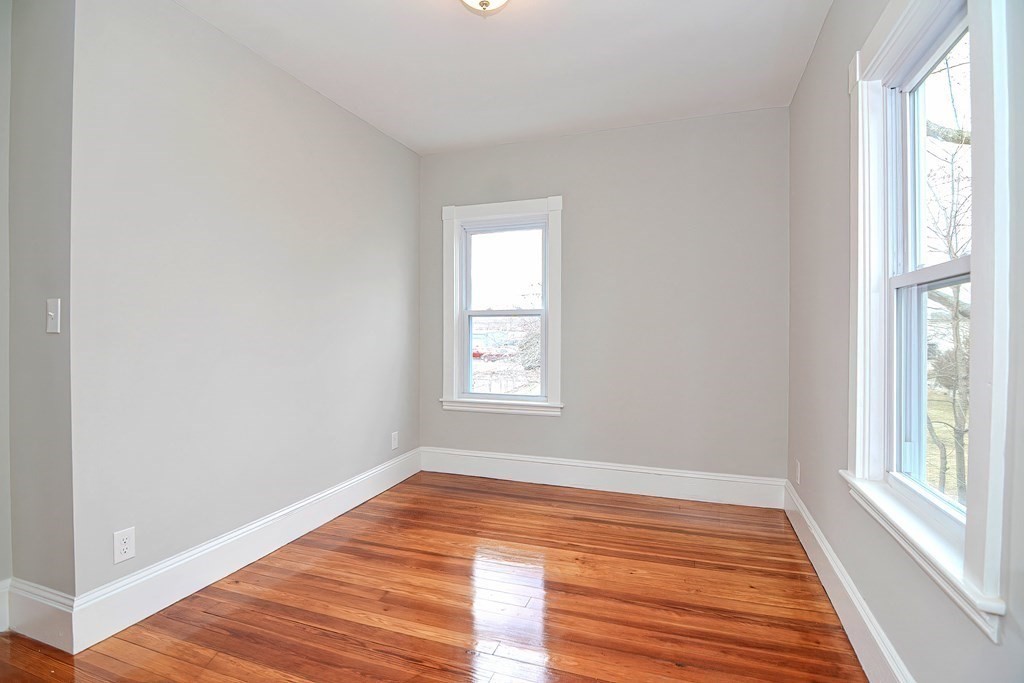 14 Allen Road Norwood, MA 02062 - Photo 25 of 36 a view of empty room with wooden floor and fan
