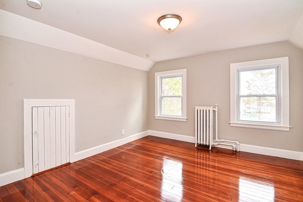 14 Allen Road Norwood, MA 02062 - Photo 28 of 36 an empty room with wooden floor and windows