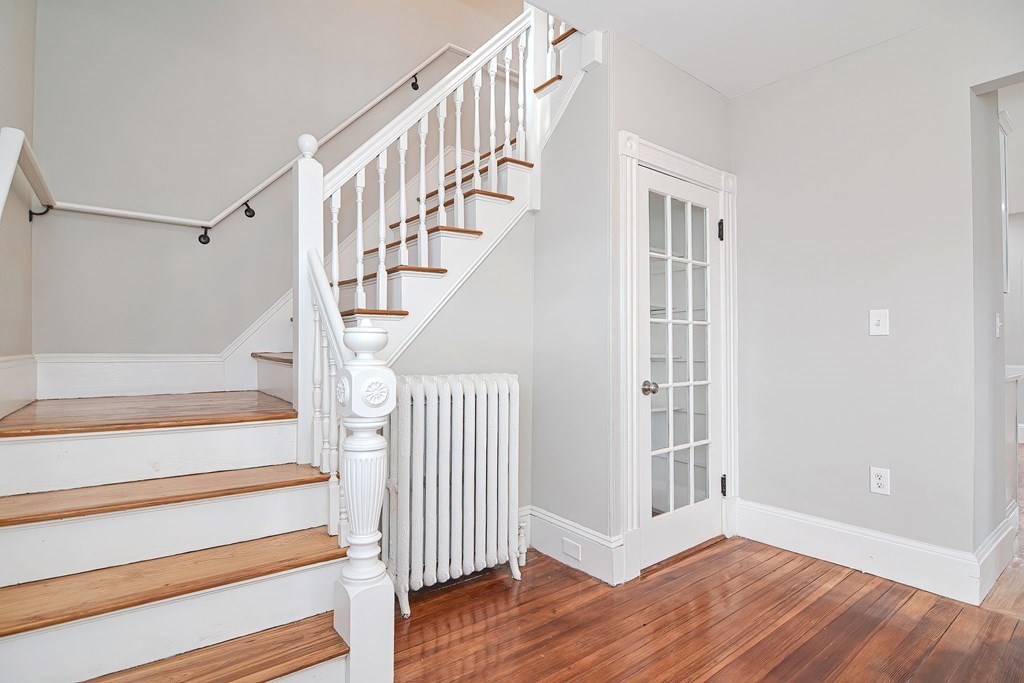 14 Allen Road Norwood, MA 02062 - Photo 3 of 36 a view of staircase with wooden floor and white walls