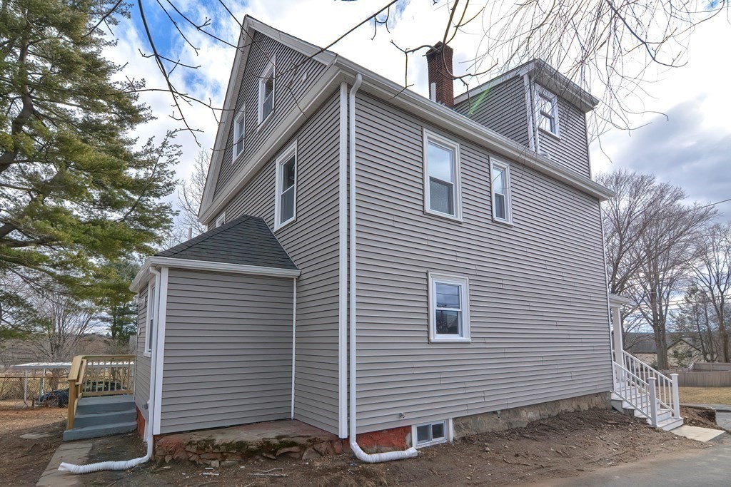 14 Allen Road Norwood, MA 02062 - Photo 32 of 36 a view of a house with a yard