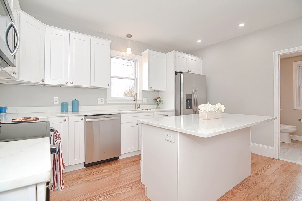 14 Allen Road Norwood, MA 02062 - Photo 5 of 36 a kitchen with a sink cabinets and window