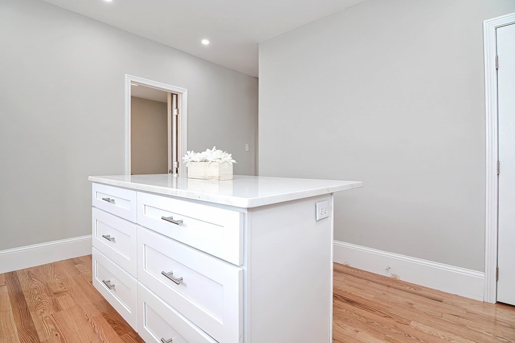14 Allen Road Norwood, MA 02062 - Photo 8 of 36 a bathroom with a sink and a mirror