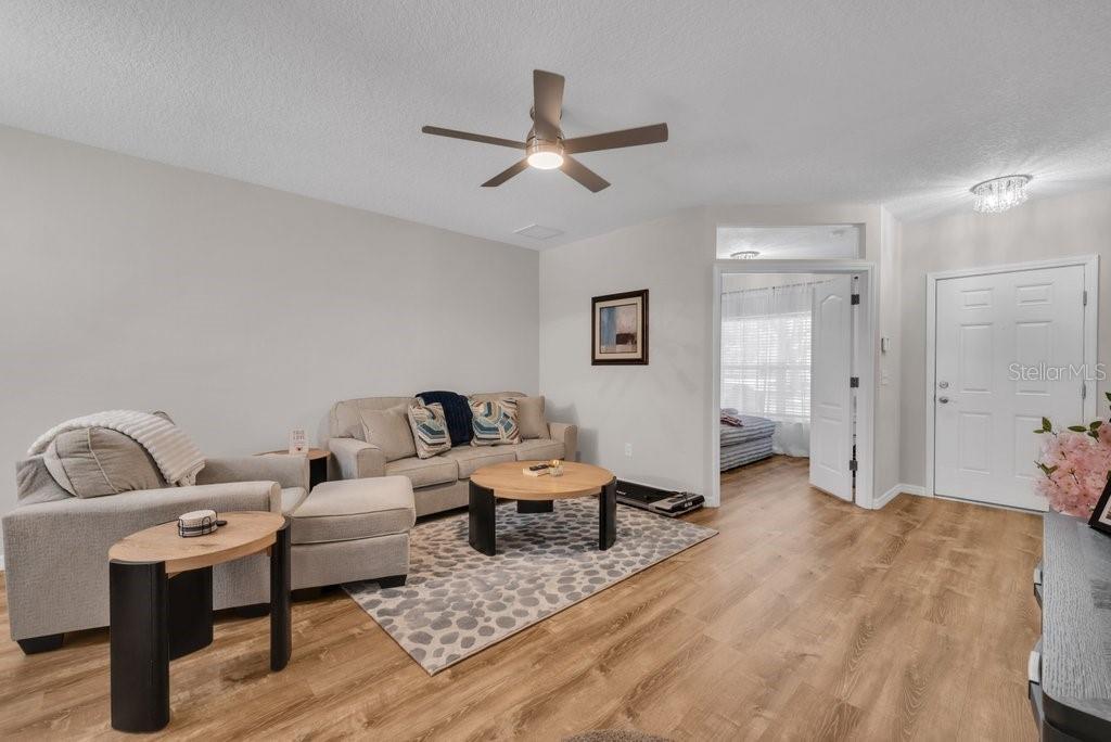 15855 Fishhawk View Drive Lithia, FL 33547 - Photo 3 of 31 a living room with furniture