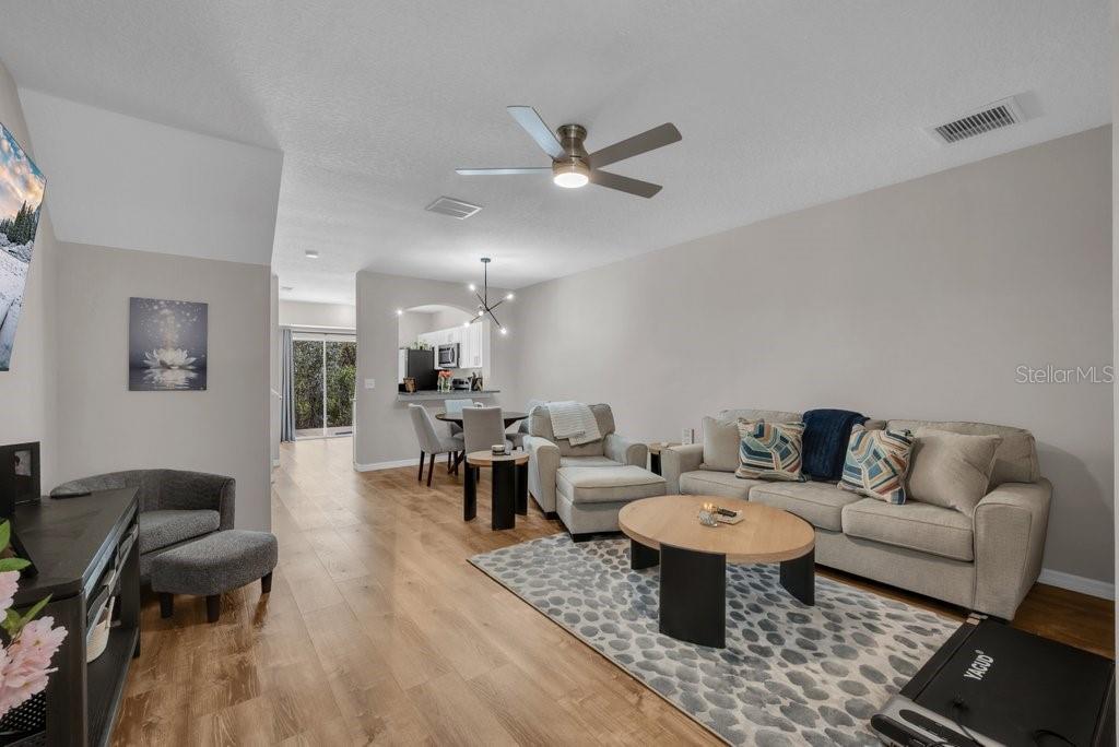 15855 Fishhawk View Drive Lithia, FL 33547 - Photo 6 of 31 a living room with furniture and a table