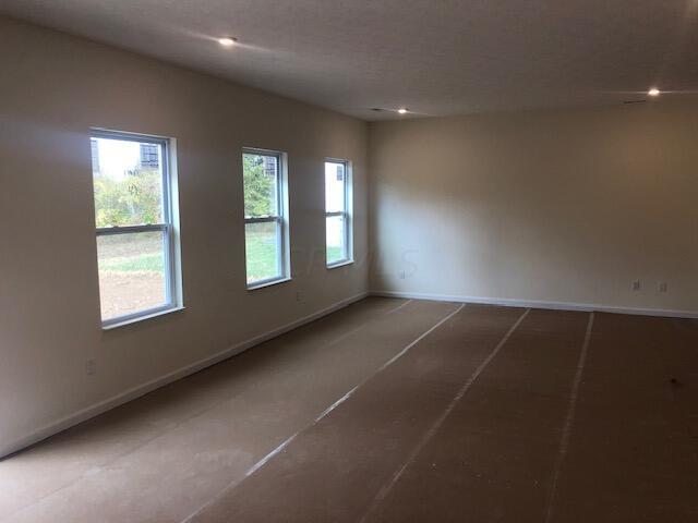 11 Thurber Road Ashville, OH 43103 - Photo 25 of 28 GREAT ROOM w/LVP FLOORING & LED LIGHTS on DIMMER