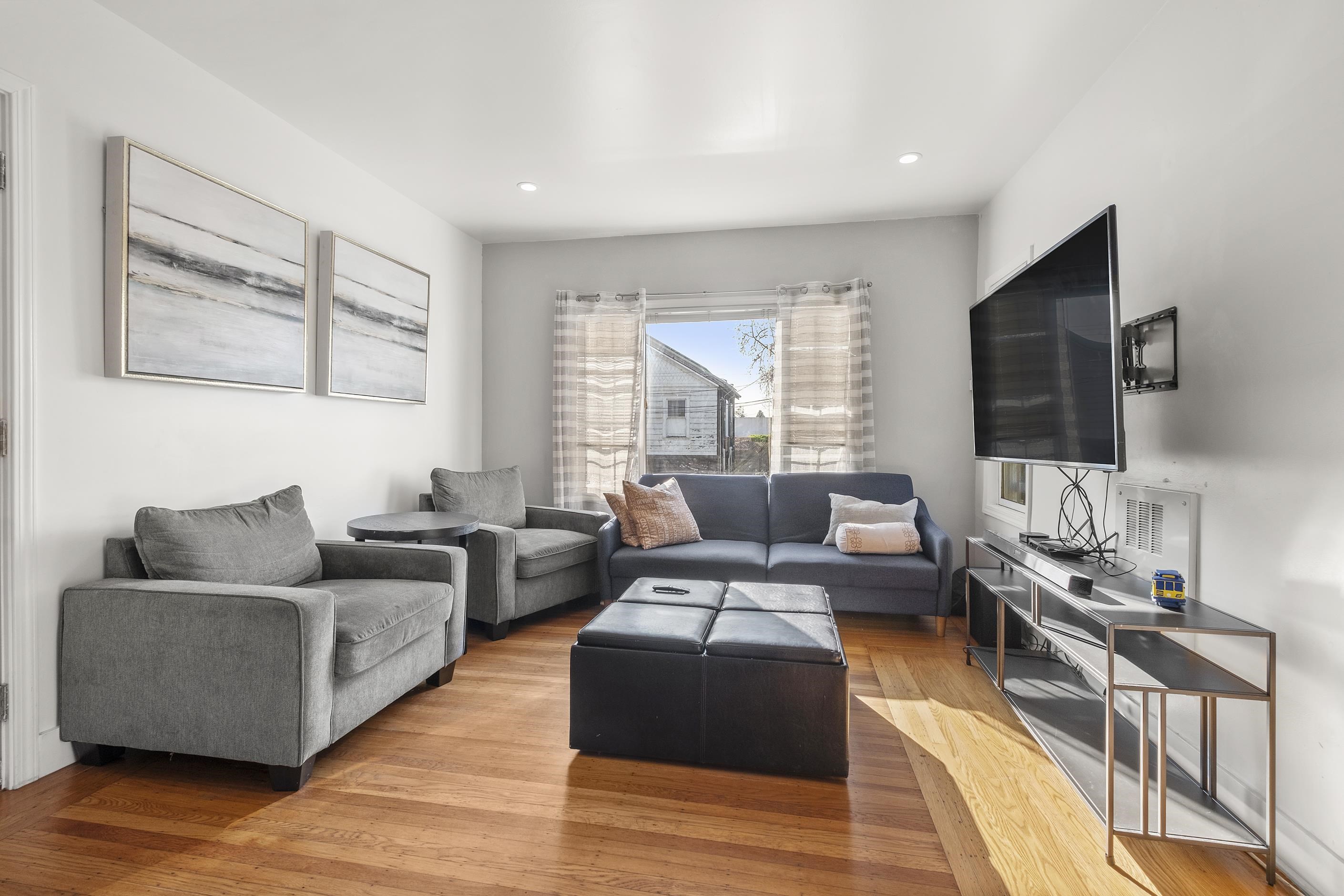 1039 Channing Way Berkeley, CA 94710 - Photo 19 of 25 Living area featuring wood finished floors and recessed lighting