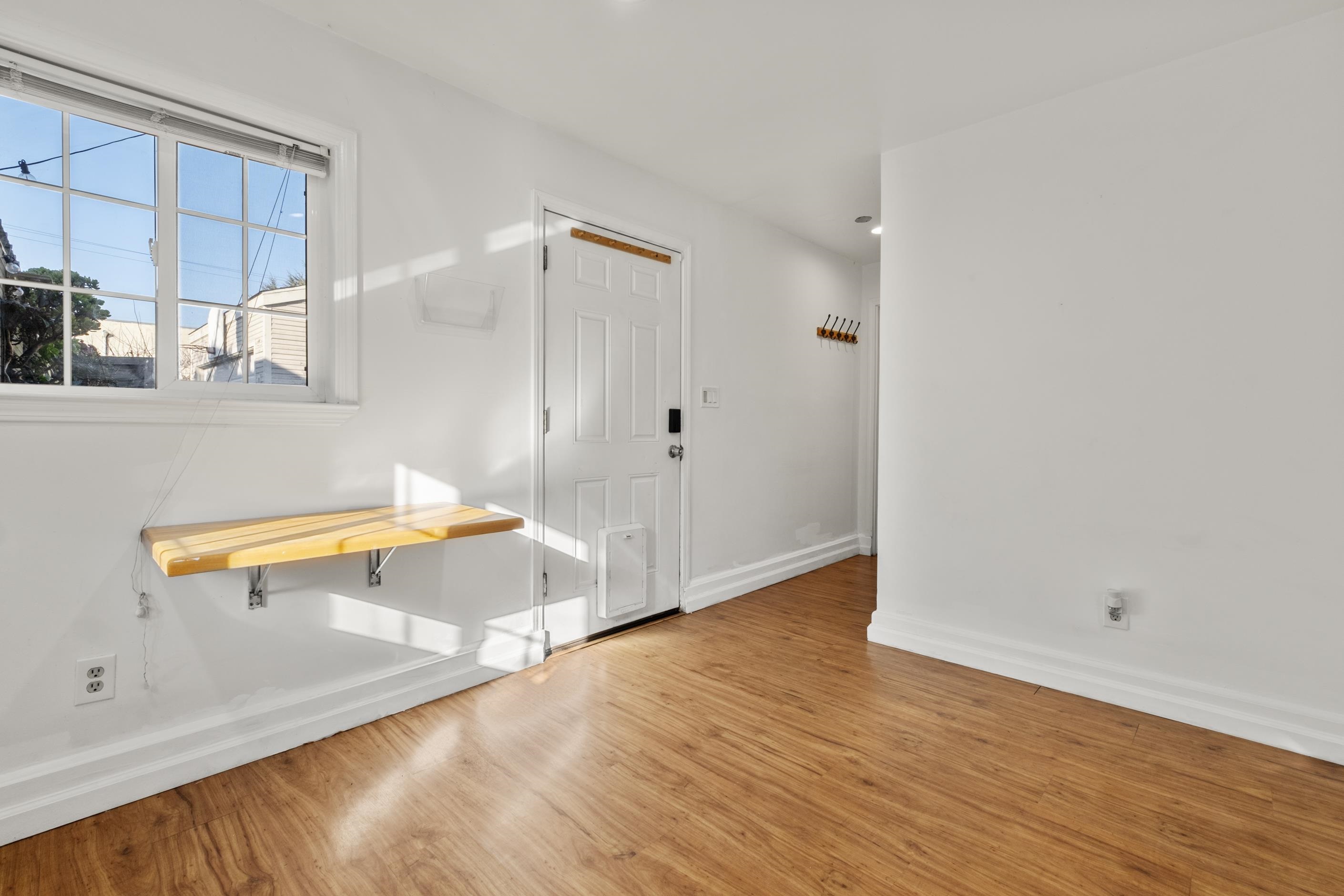 1039 Channing Way Berkeley, CA 94710 - Photo 8 of 25 Foyer with wood finished floors and baseboards