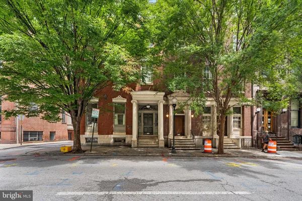 a view of a building with a street