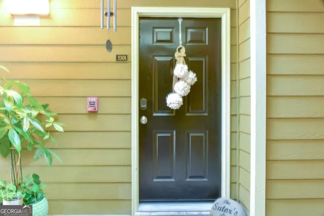a front view of a house with a shower