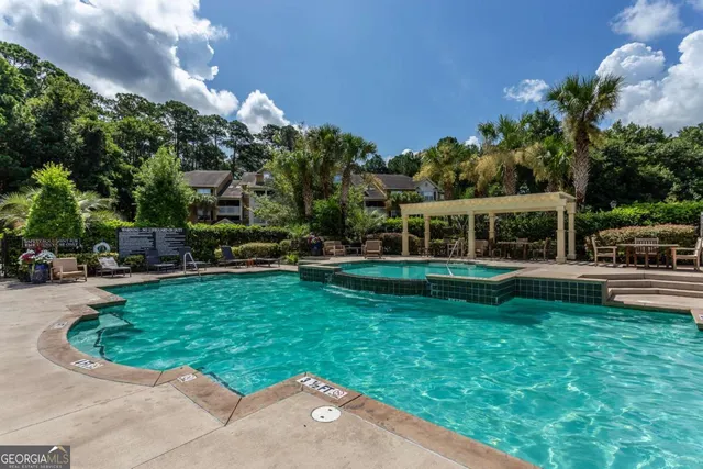 a living room with furniture or couch and a flat screen tv