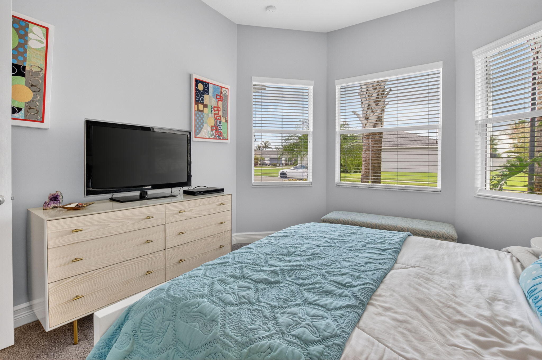 8263 Arabian Range Road Boynton Beach, FL 33473 - Photo 40 of 52 a bedroom with a bed and a flat screen tv