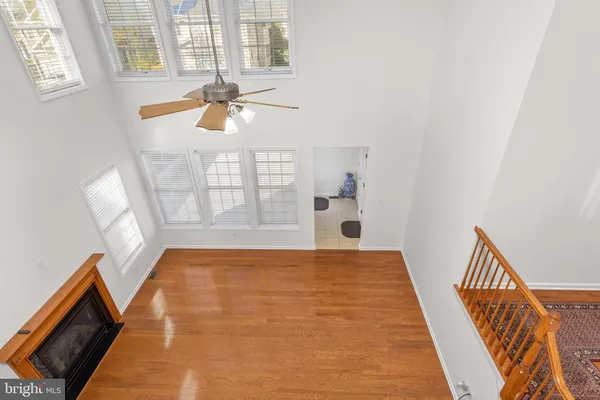 a view of empty room with windows