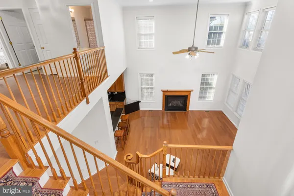 a view of an entryway with wooden floor