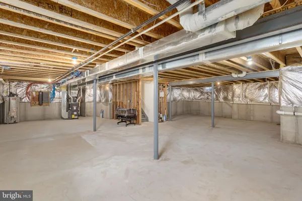 a view of an empty room with white walls