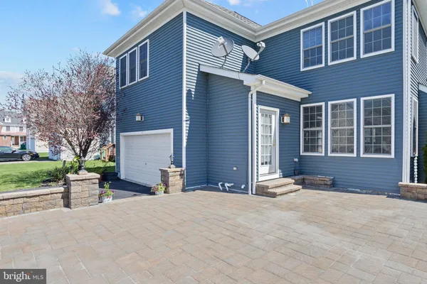 a front view of a house with a patio