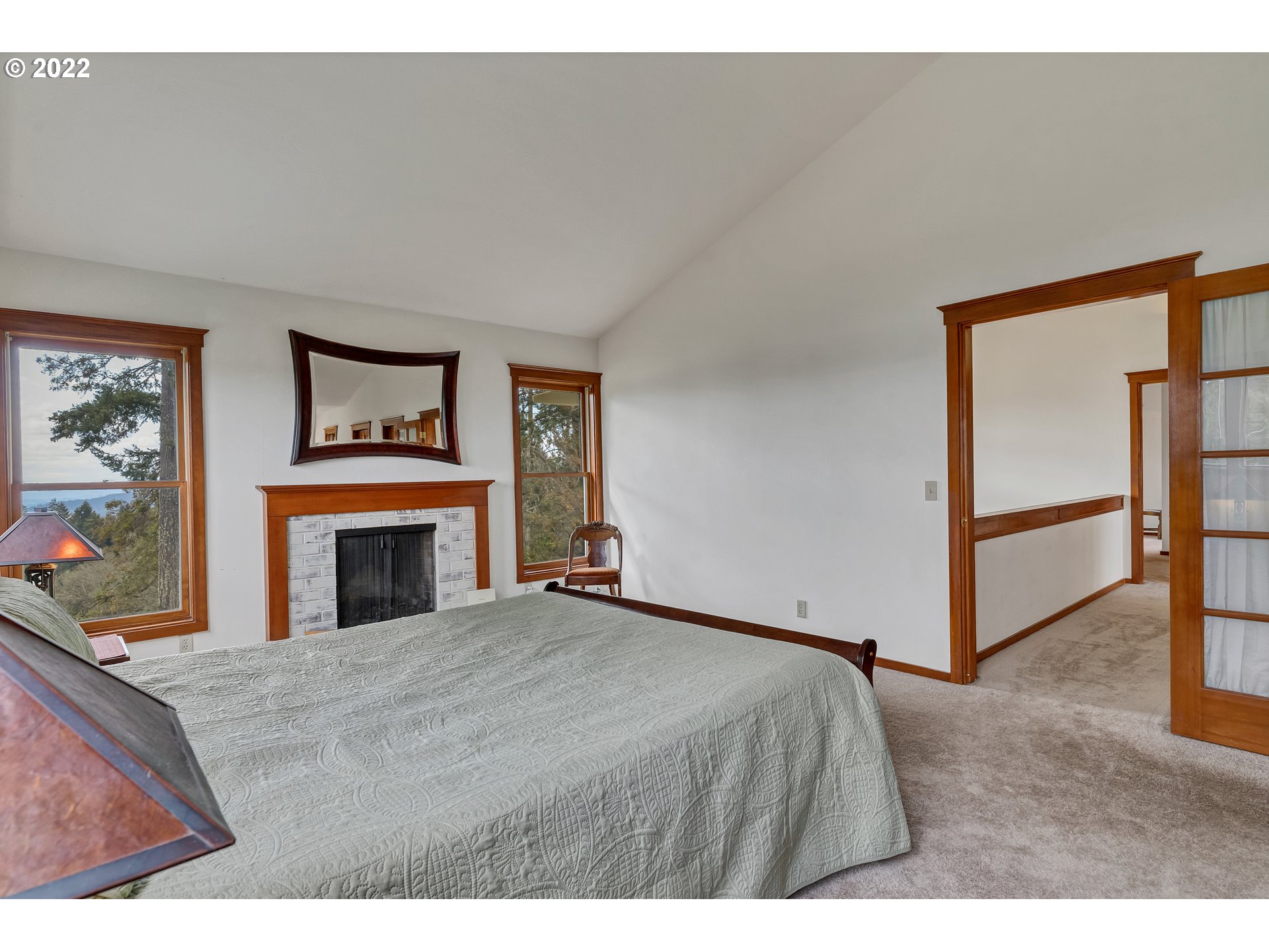 86835 R.R. Baker Road Springfield, OR 97478 - Photo 19 of 32 a view of an empty room with window and fireplace