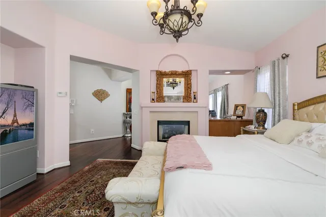 a bed room with a bed and a fireplace