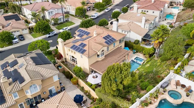 an aerial view of a house with a garden
