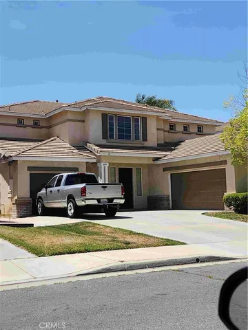 a view of houses with yard