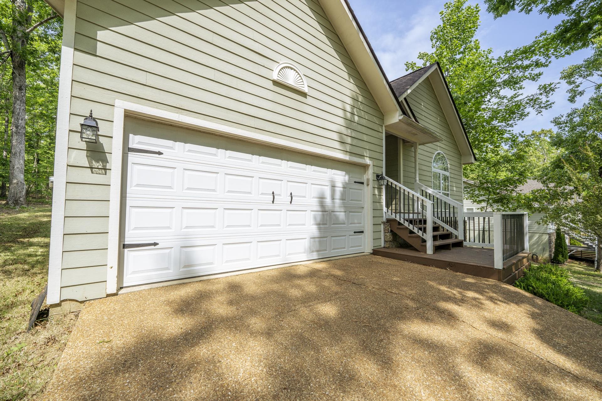 100 Masters Court Counce, TN 38326 - Photo 4 of 28 a view of a house with a garage