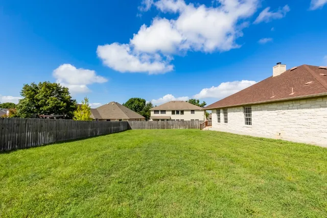 a house view with a garden space