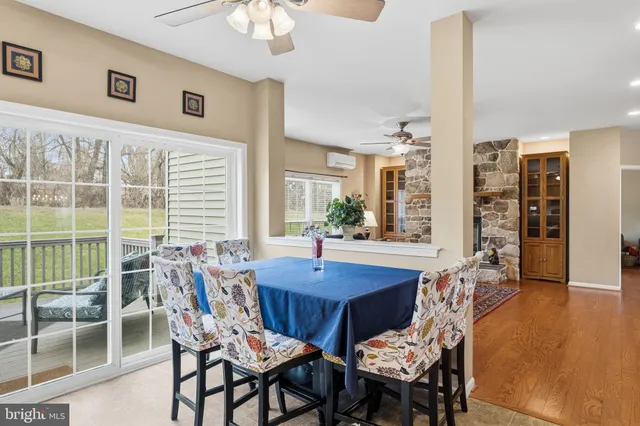 a living room with furniture flat screen tv and a fireplace