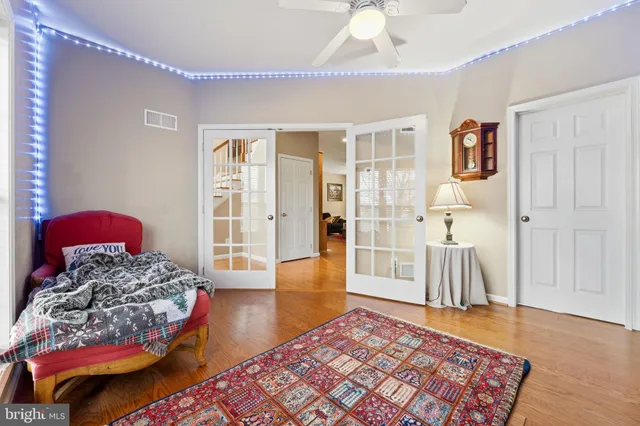 a bathroom with a sink a mirror and shower