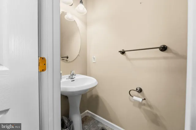 a spacious bathroom with a bathtub and a shower