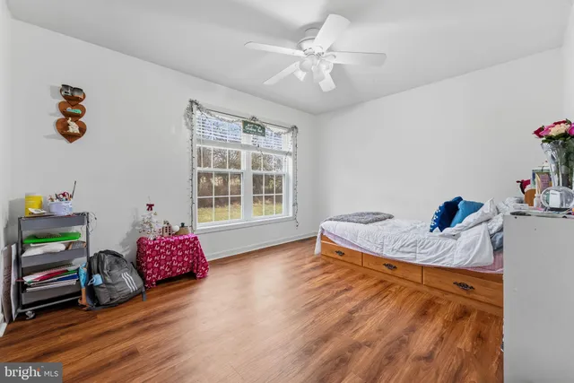 a kitchen with a refrigerator and a sink