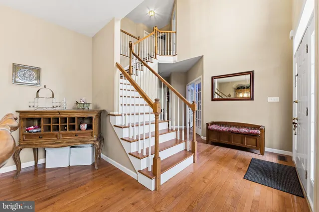 a open kitchen with a sink dining table and chairs